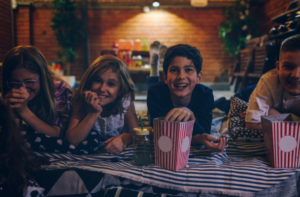 Kids eating popcorn