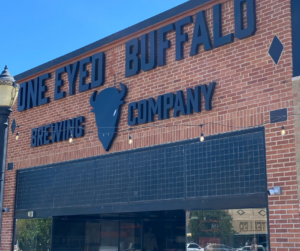 One Eyed Buffalo sign on front of building