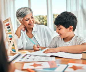 woman helping boy with math