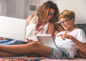 woman and boy on computers